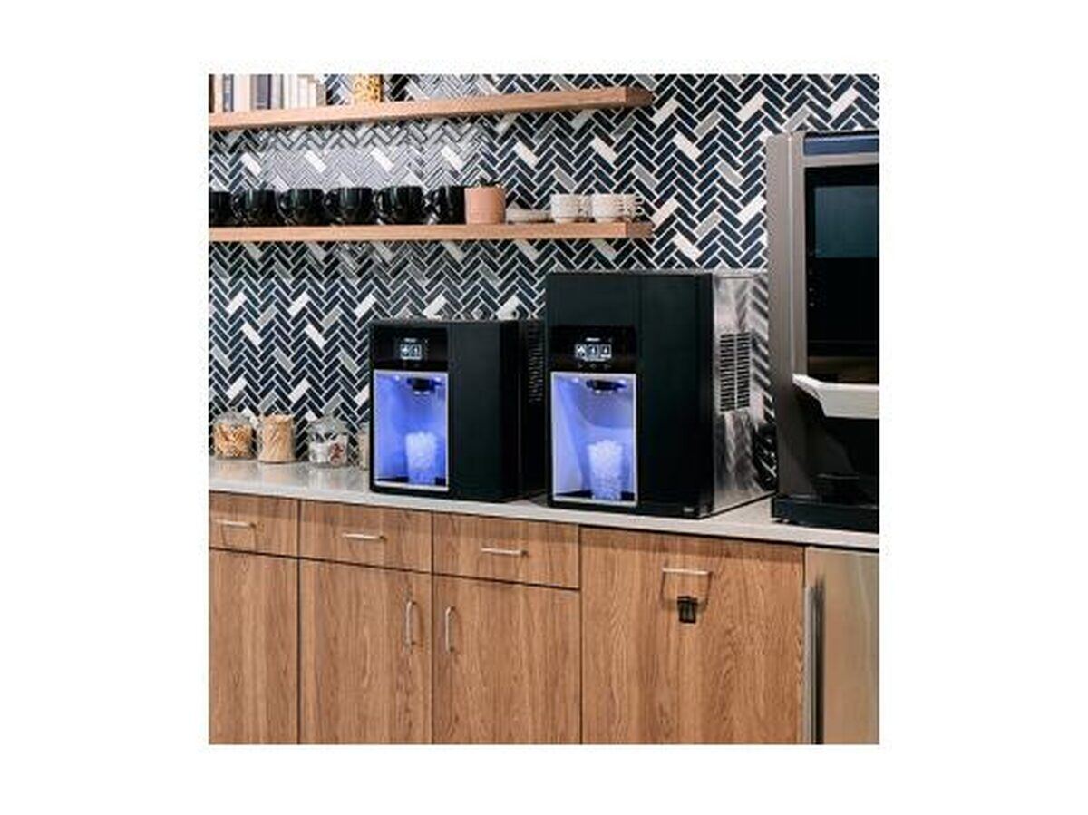 Commercial ice machines for office break rooms with herringbone tile backsplash