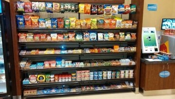 Micro Markets kiosk with snacks and checkout terminal