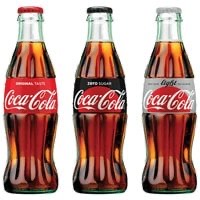 Three Coca-Cola bottles